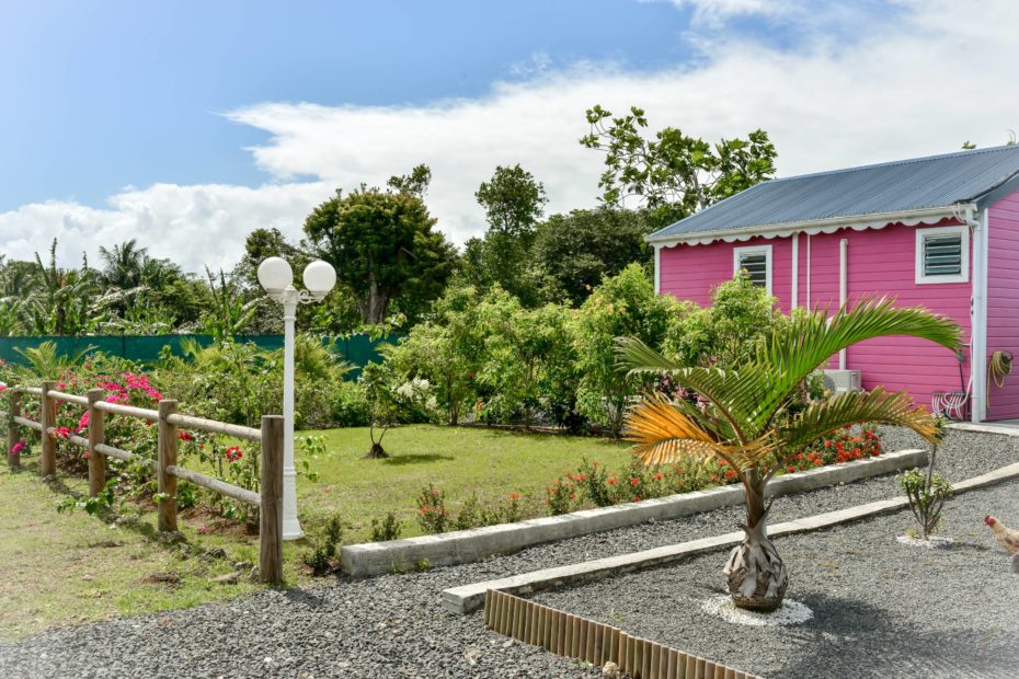 pink bungalow from far