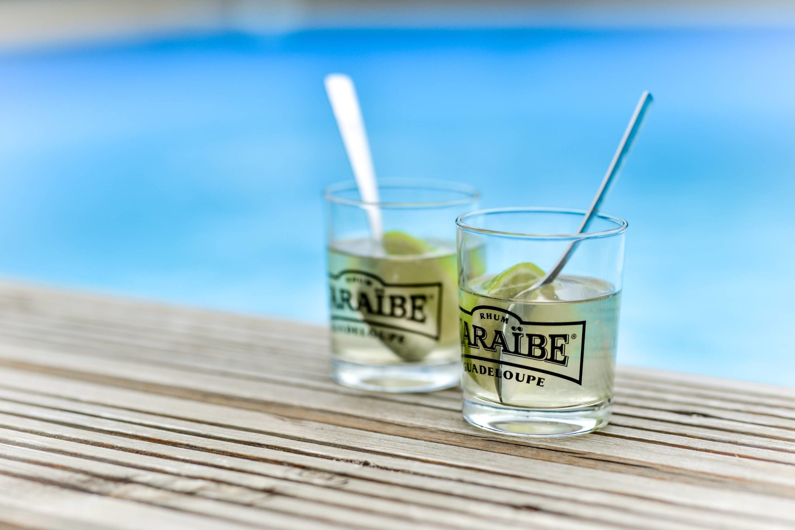a drink by the pool of chantilly's garden